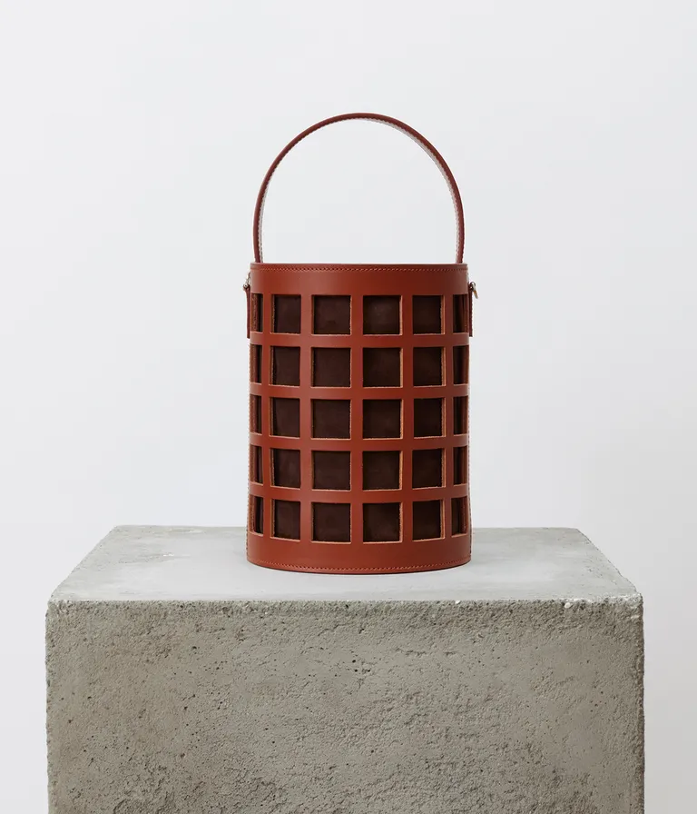 Leather basket bag by Célia Torvisco