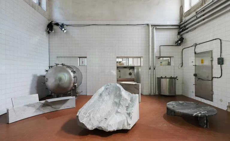 Stone furniture in abandoned industrial space