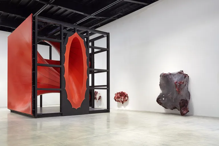 Installation view of Anish Kapoor’s Museo d’Arte Contemporanea Roma, including the artist’s enormous red sculpture, Sectional Body Preparing for Monadic Singularity at 