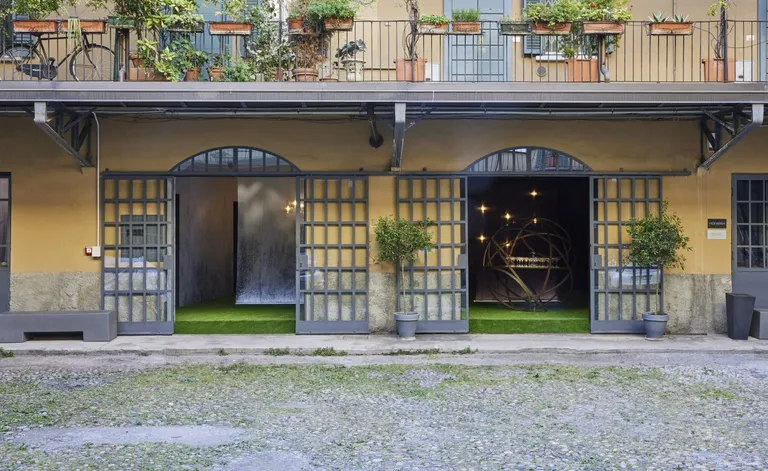 Milan courtyard with fuorisalone installation