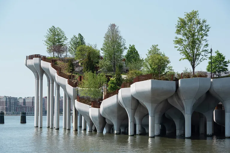 side view of Heatherwick studio’s Little Island in New York with its large concrete foundations
